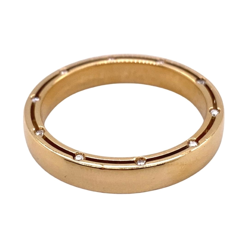 an 18 karat gold ring with diamonds