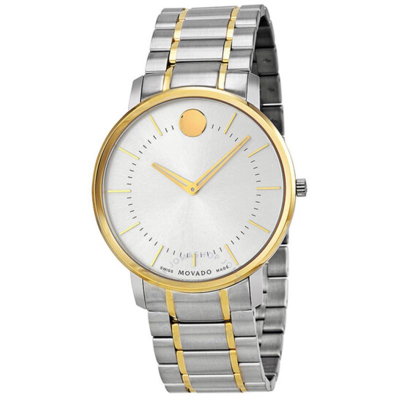 a silver and gold watch on a white background