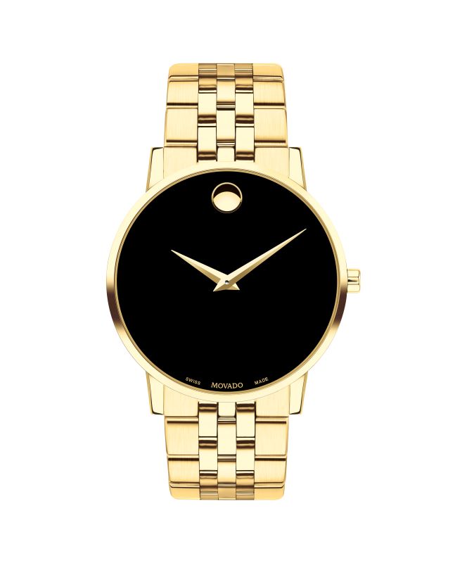 a gold watch with black dials on a white background