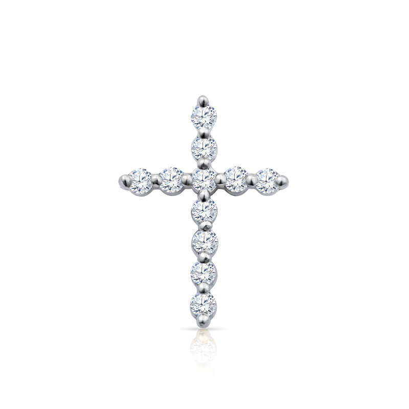 a diamond cross pendant on a white background