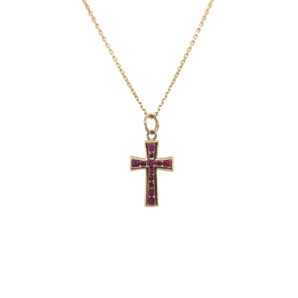 a cross necklace with pink stones on it