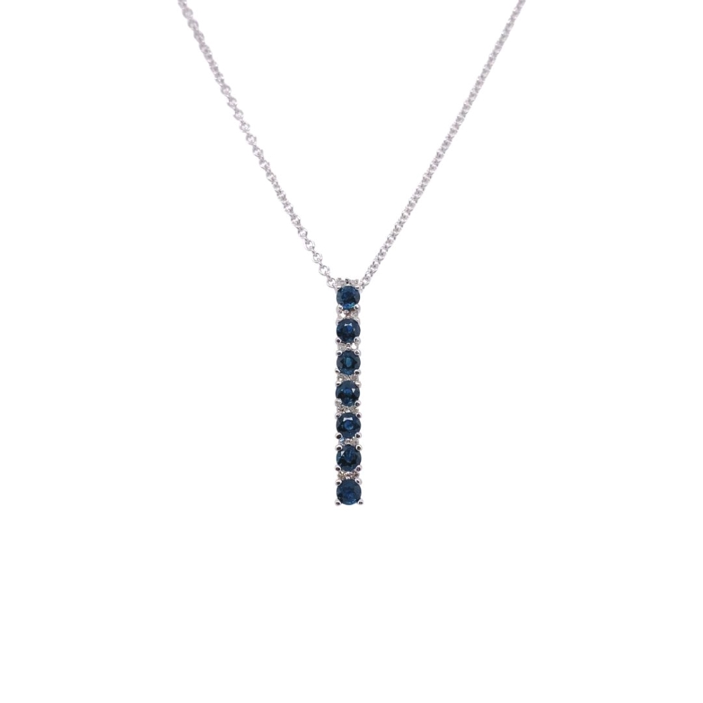 a necklace with three blue stones on it