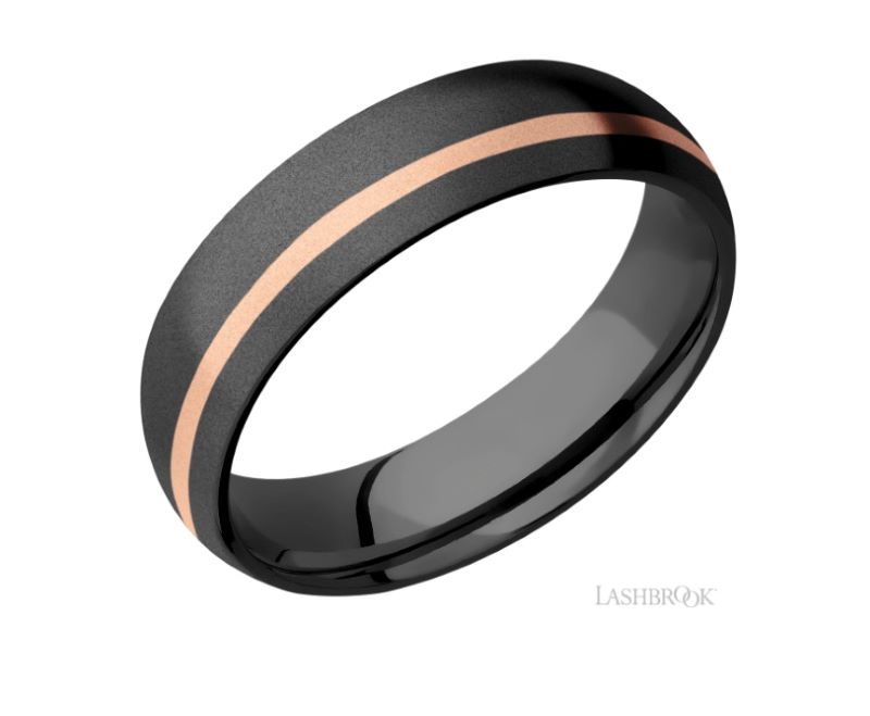 a black and rose gold wedding band