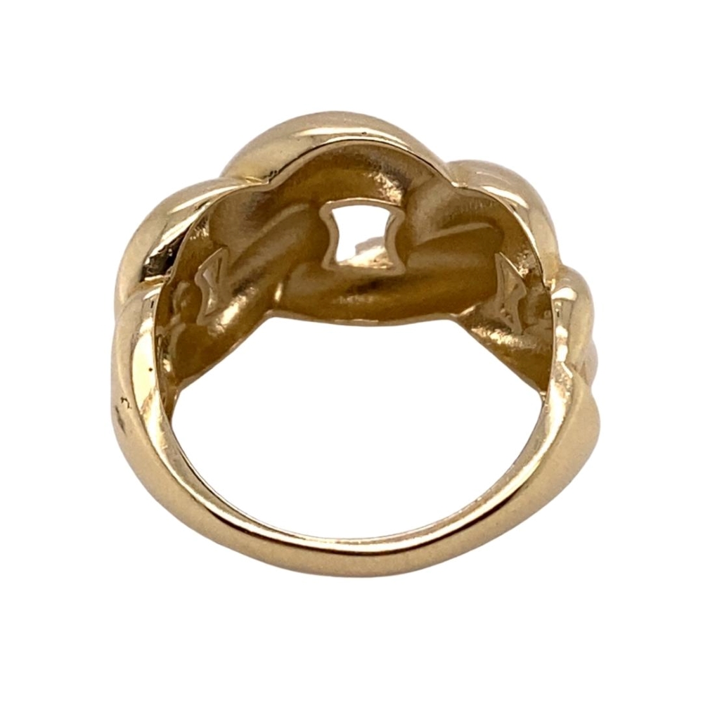 a gold ring with an intertwined design