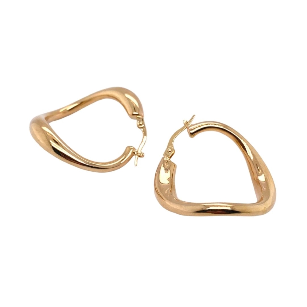 two pairs of gold earrings on a white background
