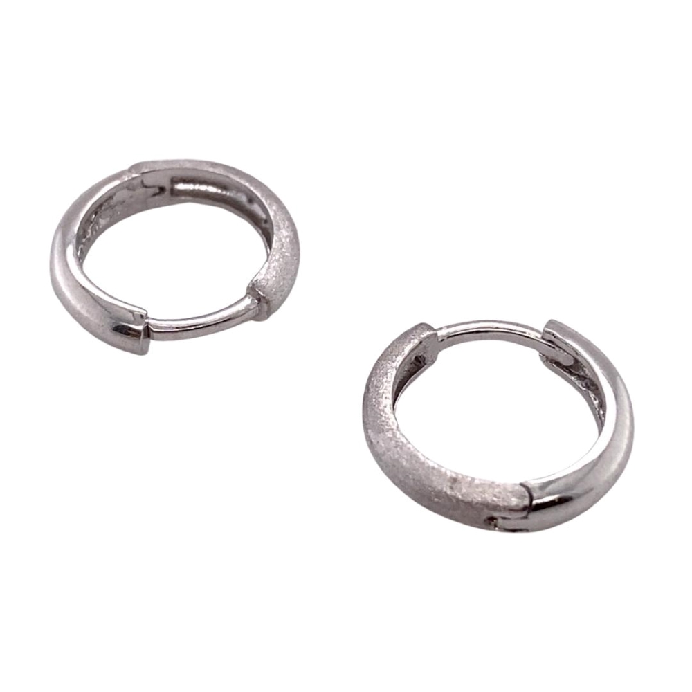 two silver hoop earrings on a white background