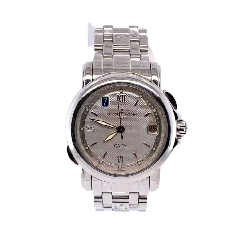 a watch with a silver dial and two hands