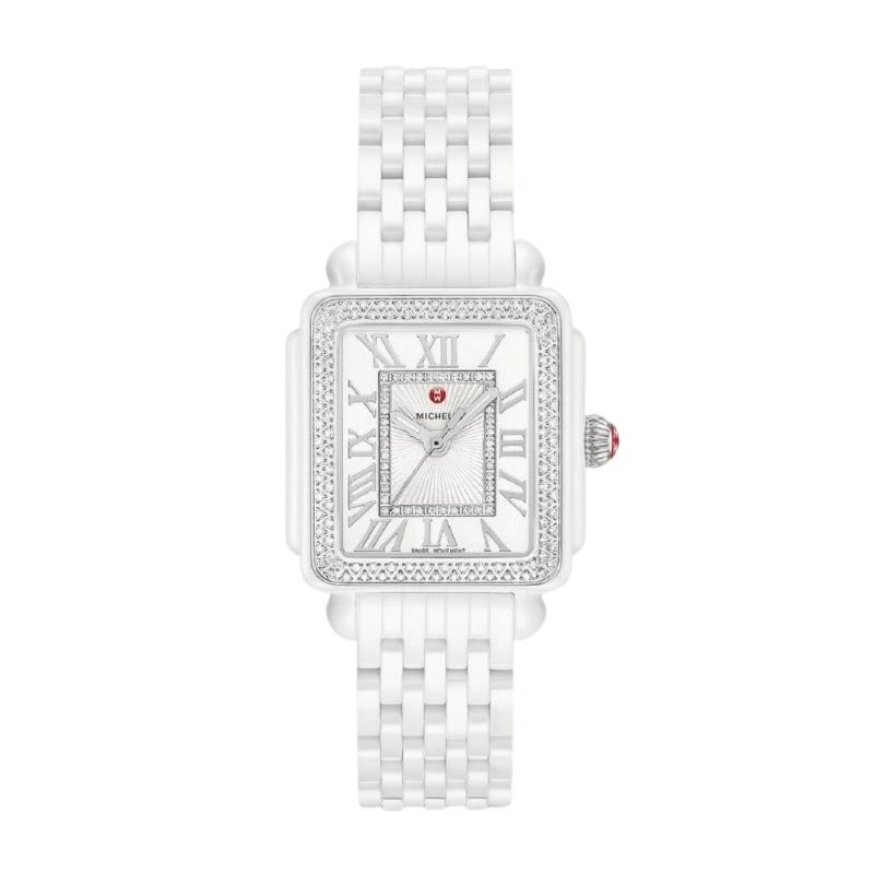 a white watch with diamonds on the face