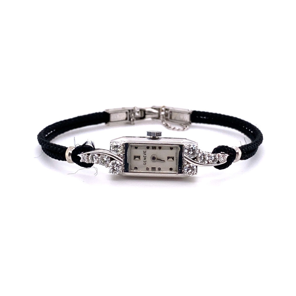 a black leather bracelet with a square watch on it