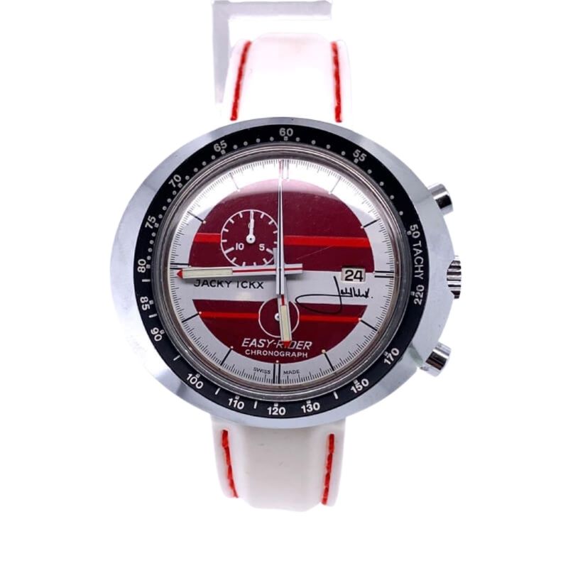 a white watch with red and black dials
