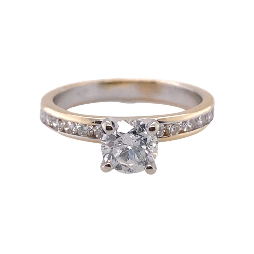 a diamond engagement ring with channel set diamonds