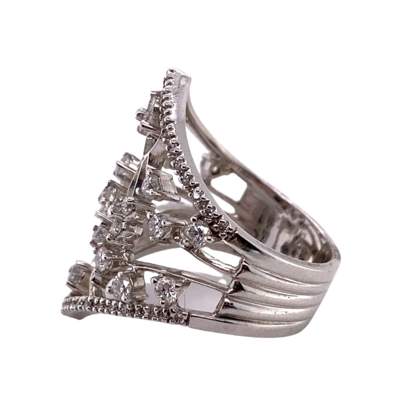 a silver ring with three rows of diamonds