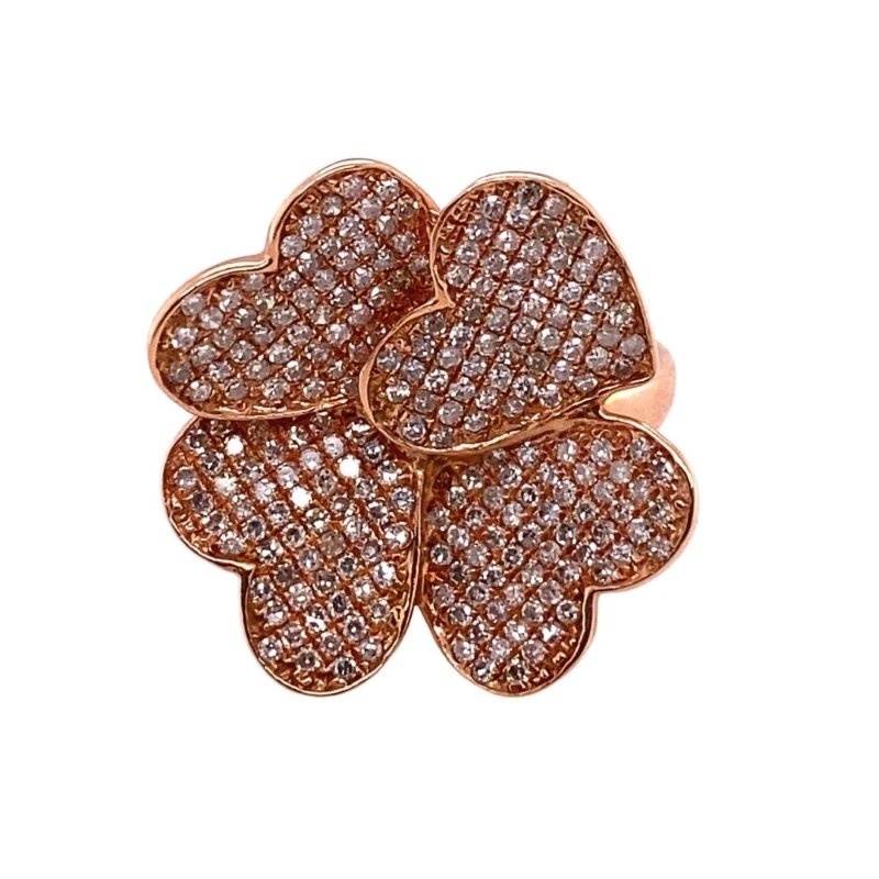 a rose shaped ring with brown diamonds on it