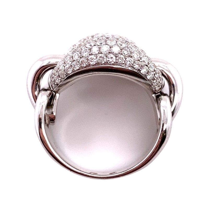 a silver ring with diamonds on it