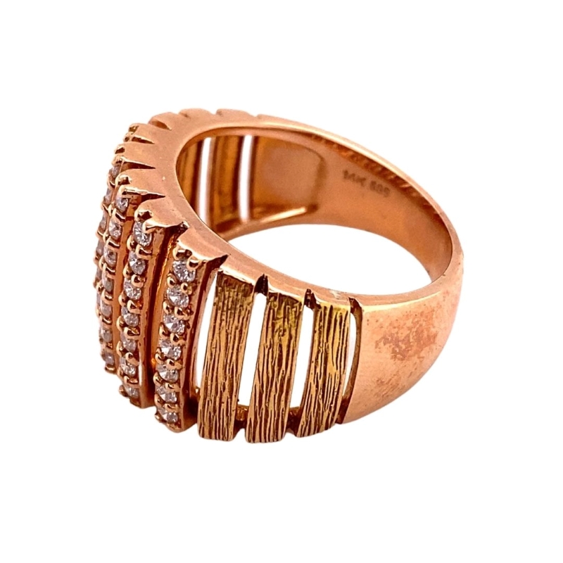 a gold ring with three rows of diamonds