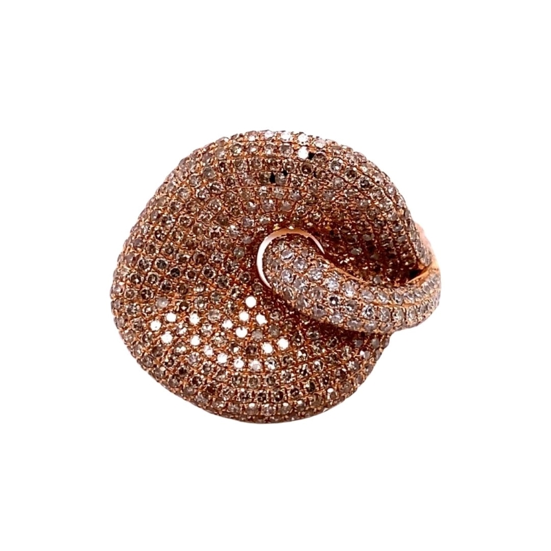 a ring with brown and white diamonds on it