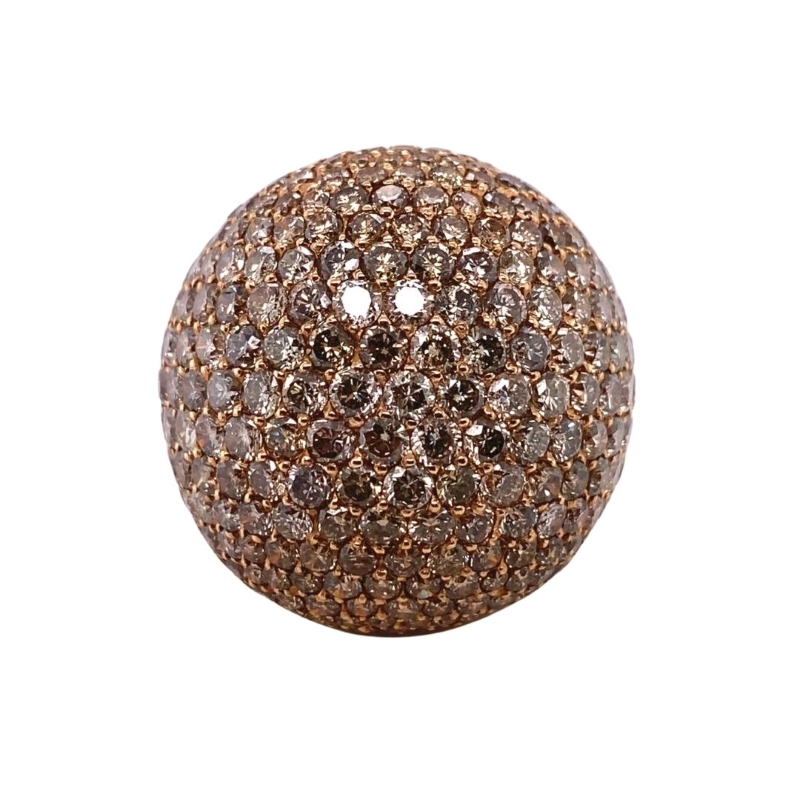 a brown and white diamond ball on a white background