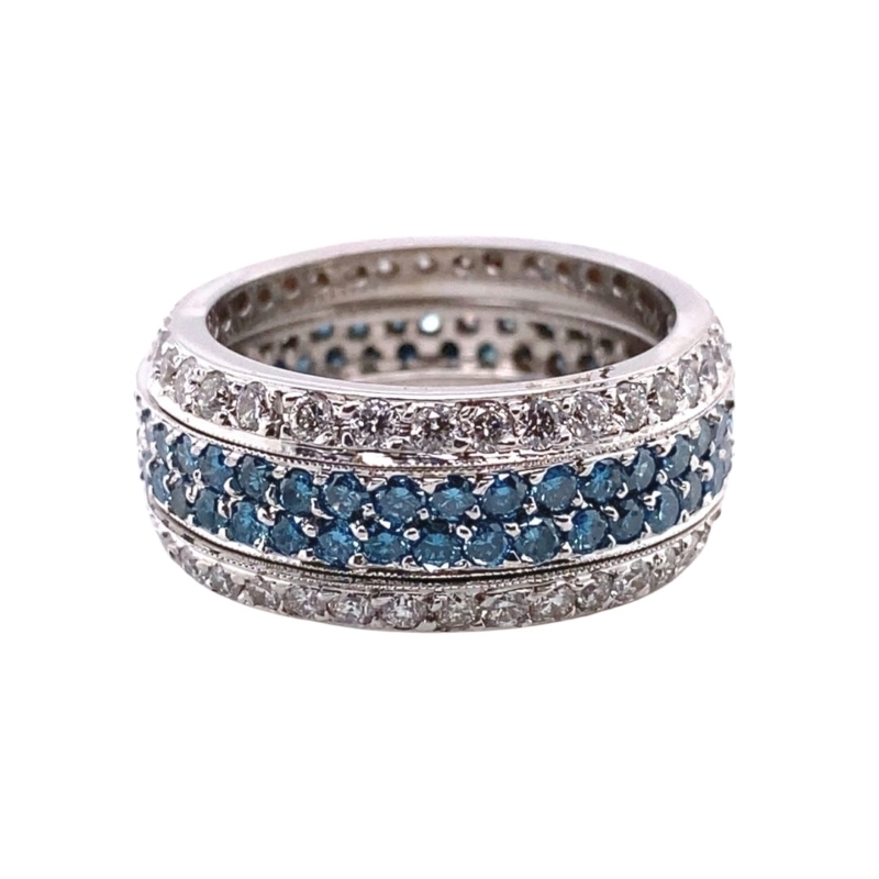 a ring with blue and white diamonds