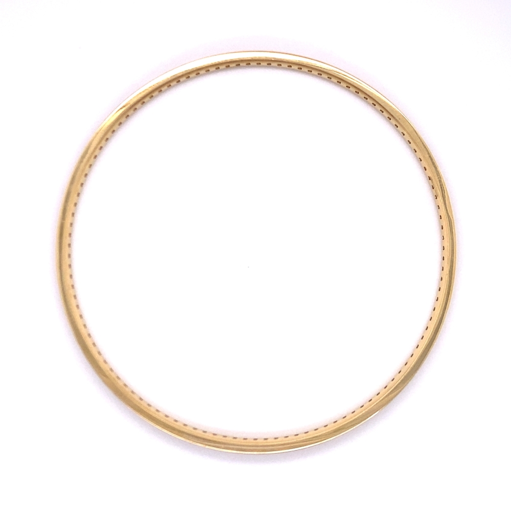 a gold colored ring on a white background