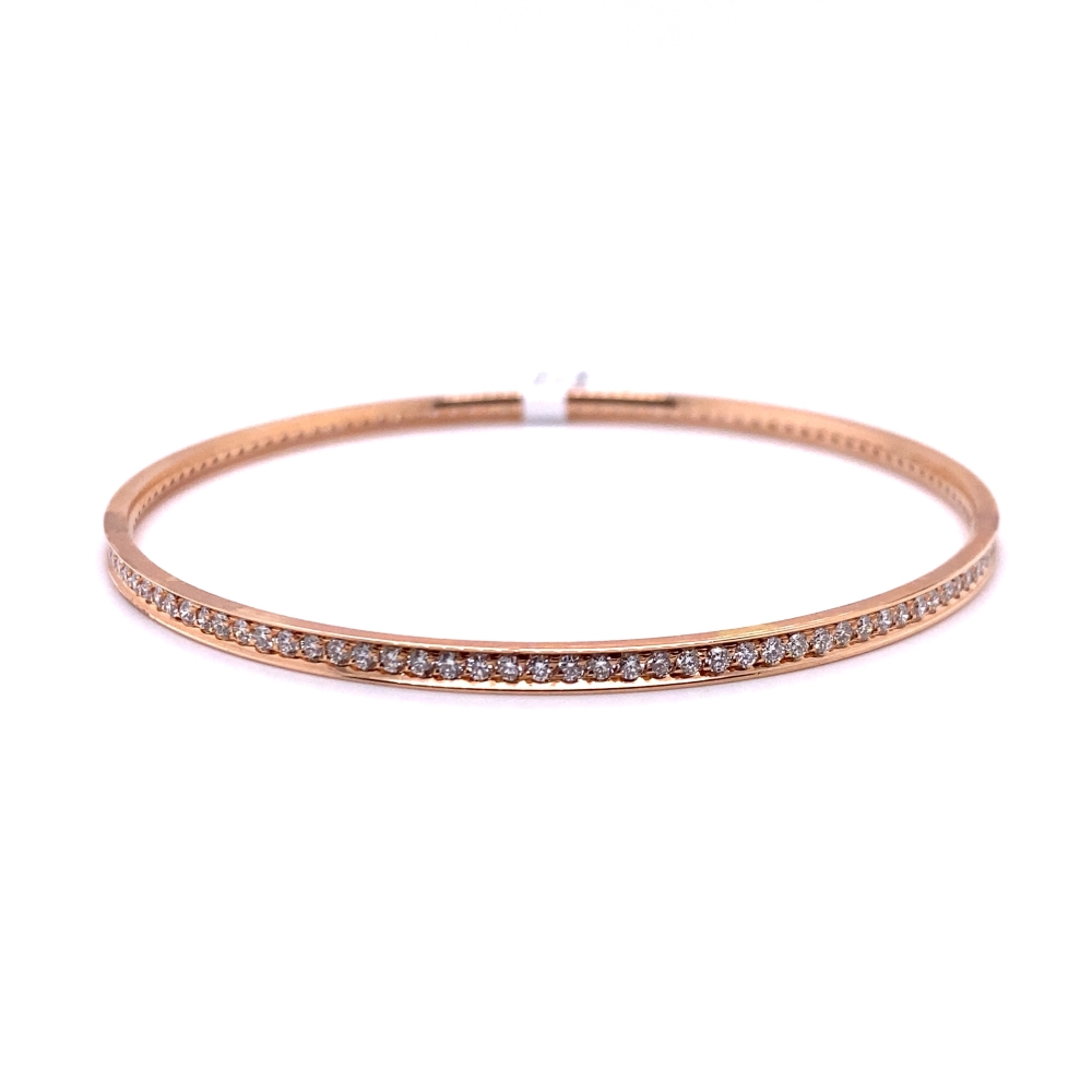 a gold bracelet with diamonds on it