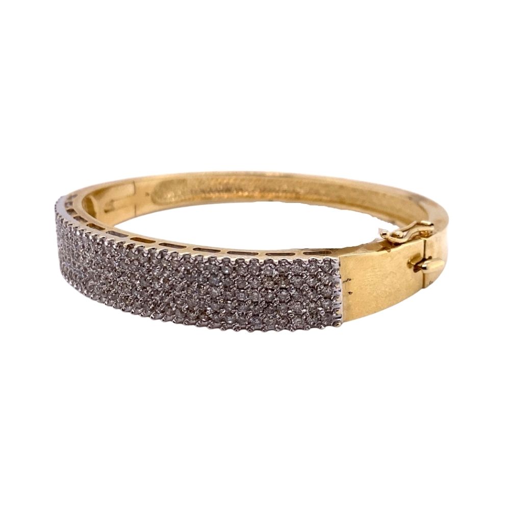a gold and diamond ring on a white background