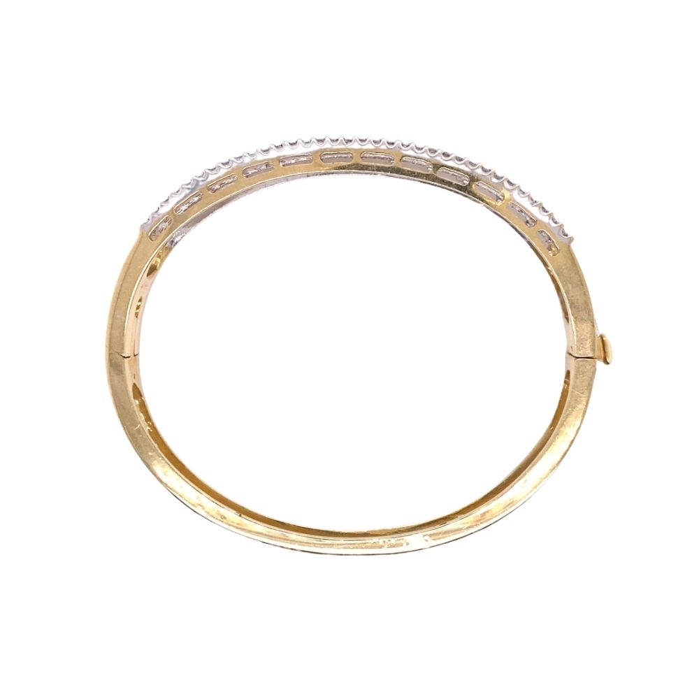 a yellow gold ring with white diamonds