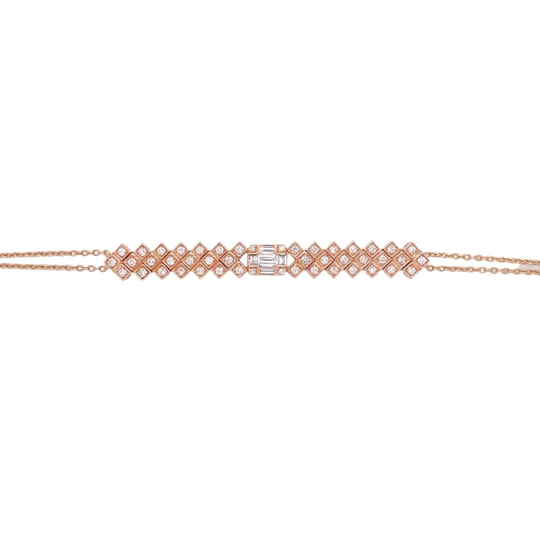 a gold bracelet with diamonds on it