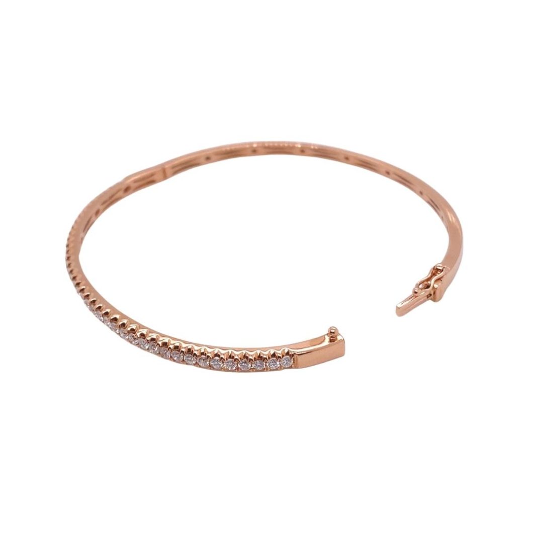 a rose gold bracelet with diamonds