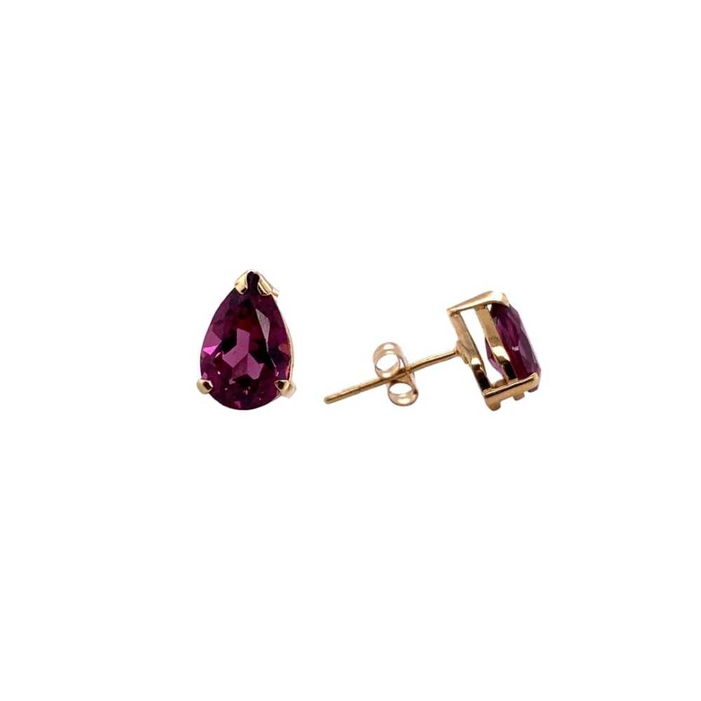 a pair of earrings with a pear shaped purple stone