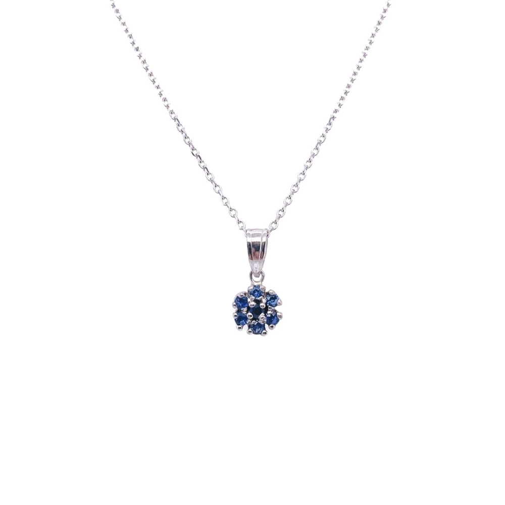 a blue diamond pendant on a chain