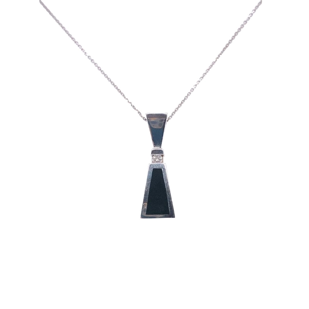 a black and white necklace on a chain