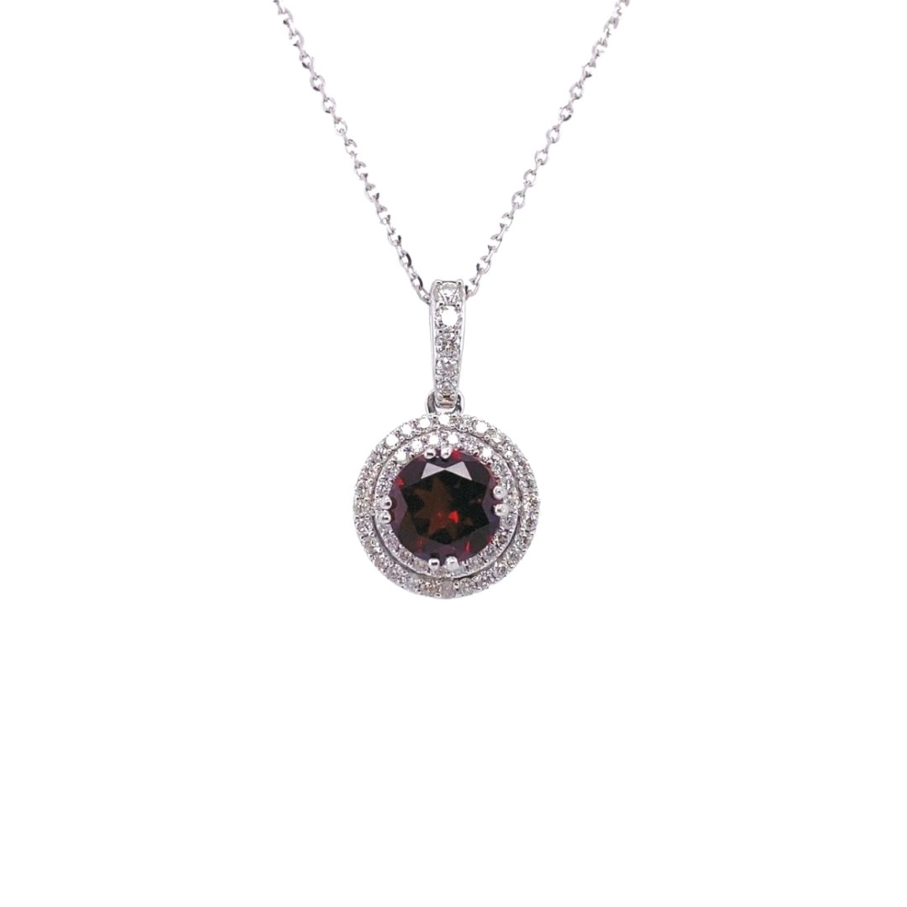 a necklace with a large red stone in the center