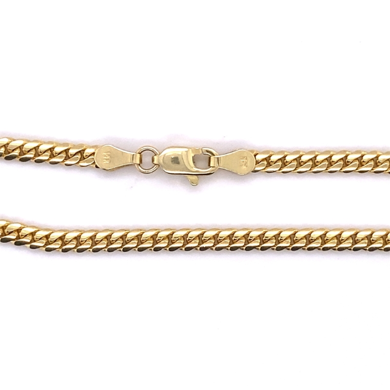 two gold chains on a white background