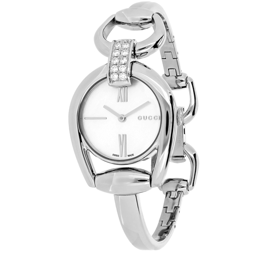 a women's watch with diamonds on the dial