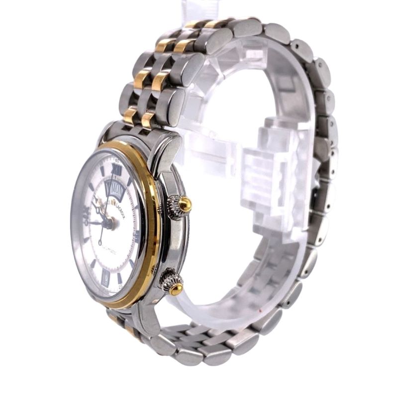 a watch with two tone gold and silver bracelets