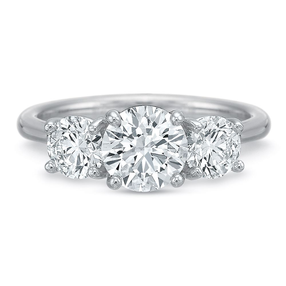 three stone engagement ring with diamond shoulders