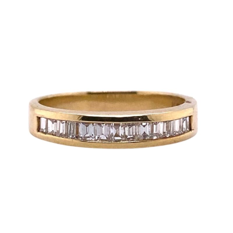 an 18 carat gold band with baguets