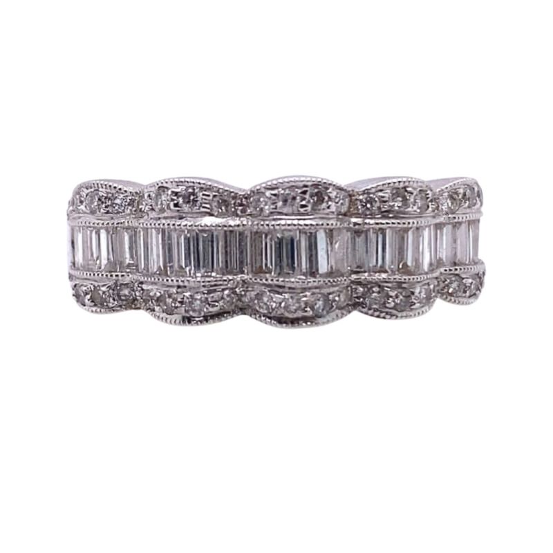 a white gold ring with baguetts and diamonds