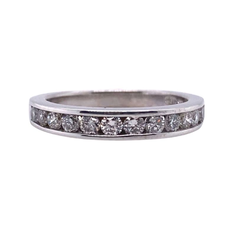 a wedding ring with five diamonds on it