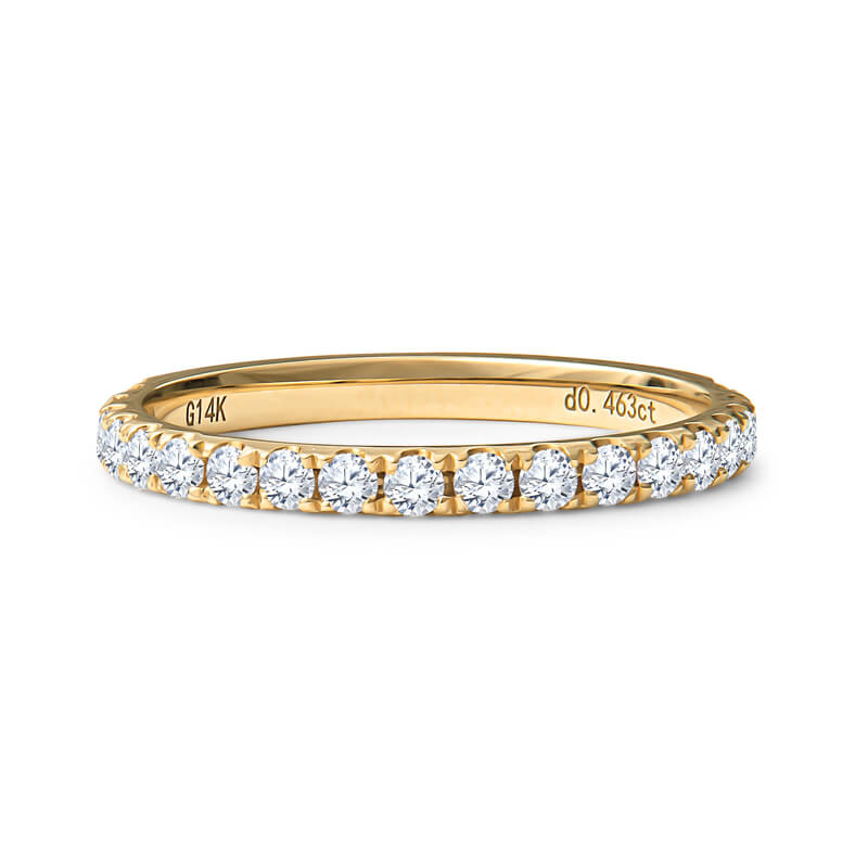 a yellow gold band with rows of diamonds
