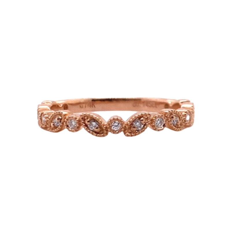 a rose gold ring with diamonds