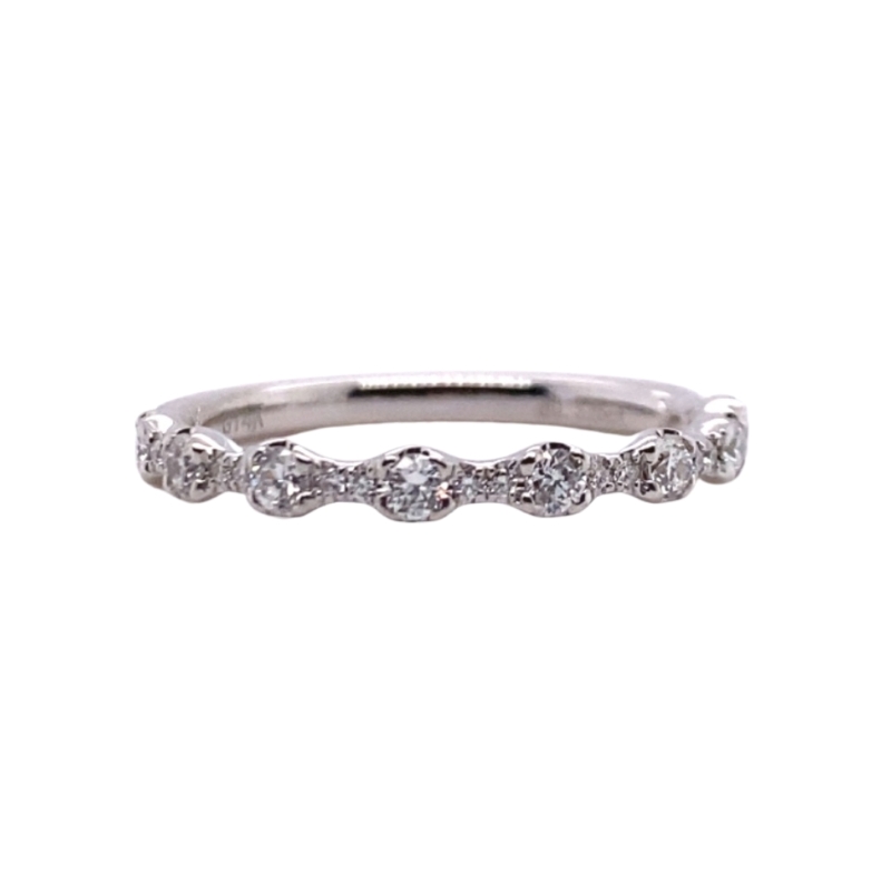 a white gold wedding band with five diamonds