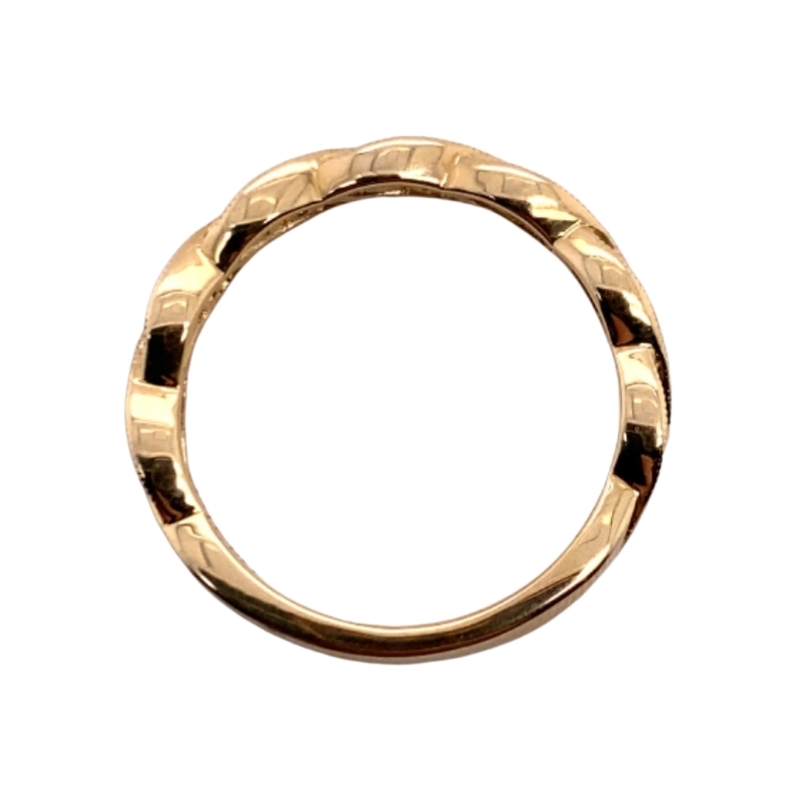 a gold ring on a white background