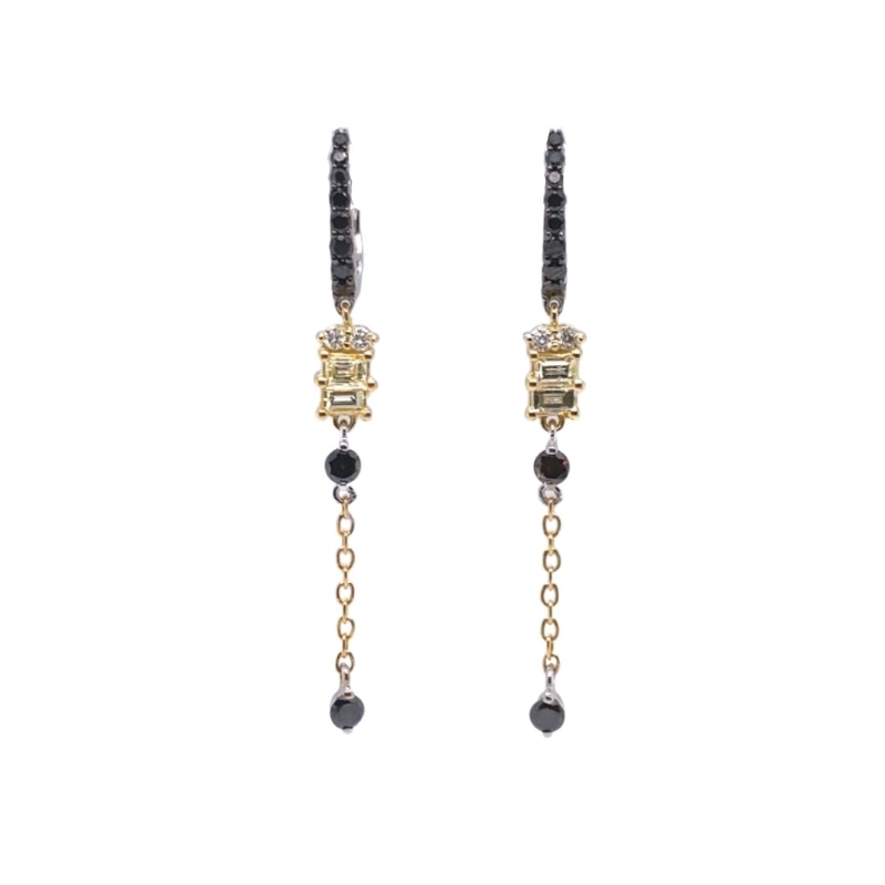 a pair of earrings with black and gold chains