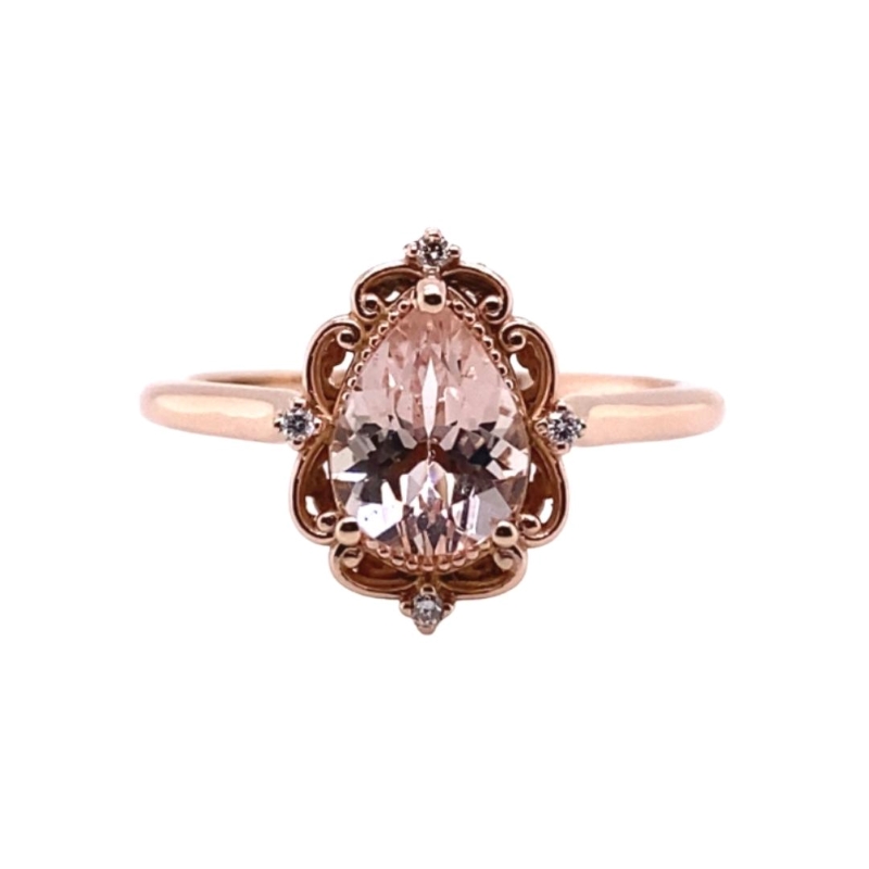 a ring with an oval shaped pink diamond