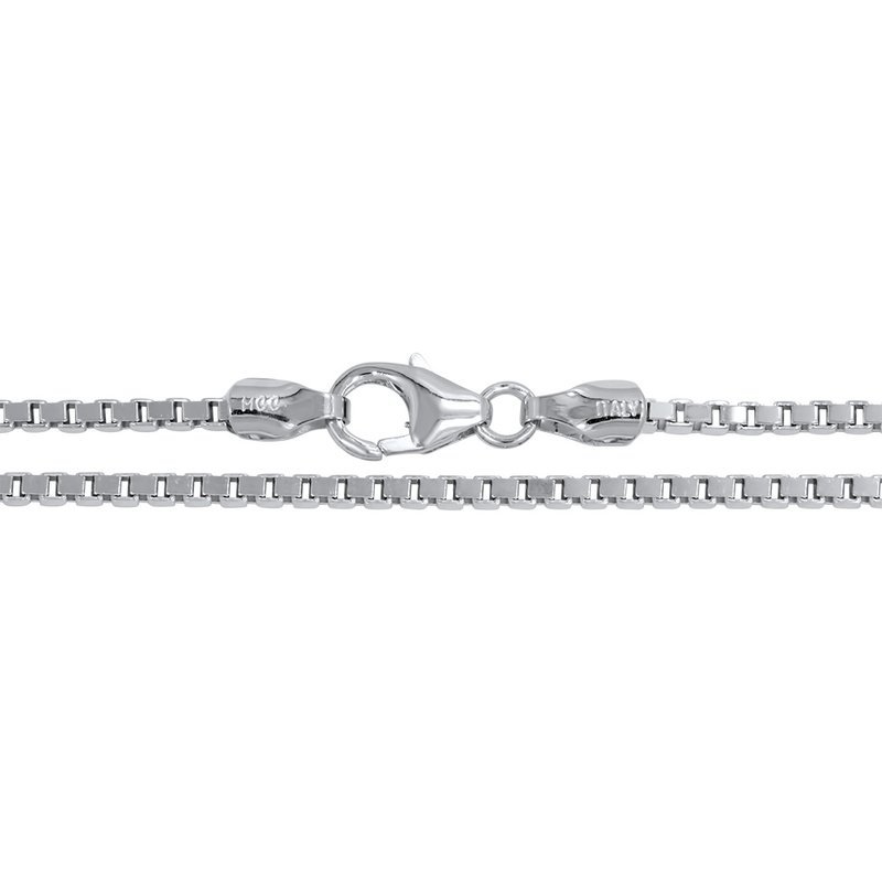 a white gold chain is shown on a white background