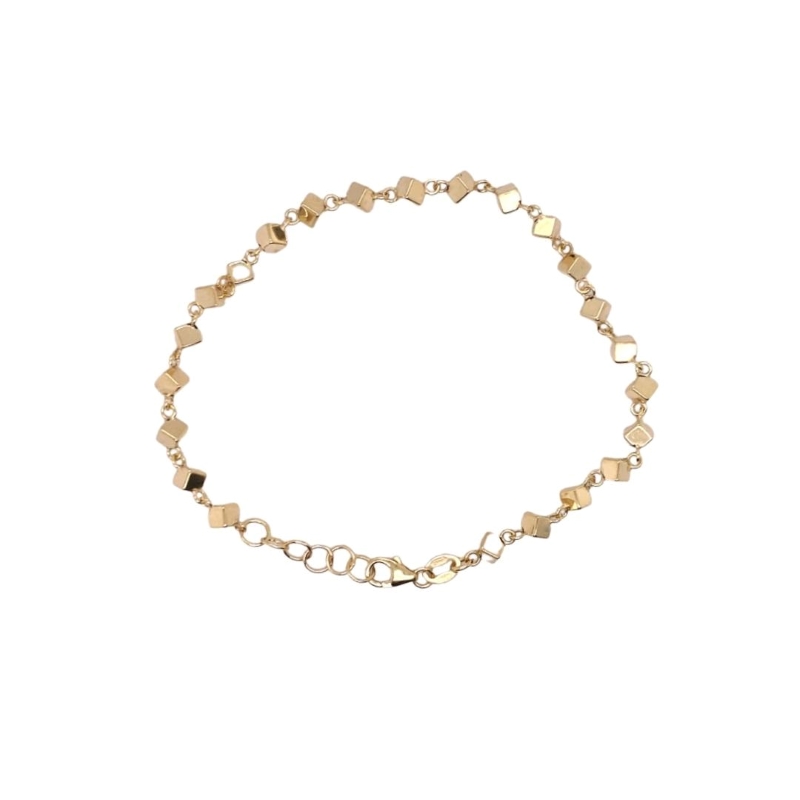 a gold bracelet with hearts on it