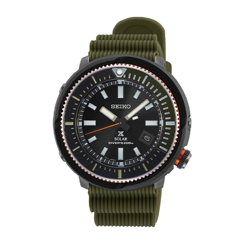 a watch with a black face and green strap