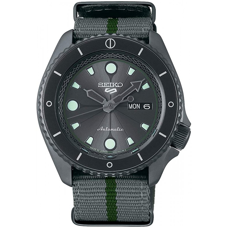 a black watch with green accents on the face