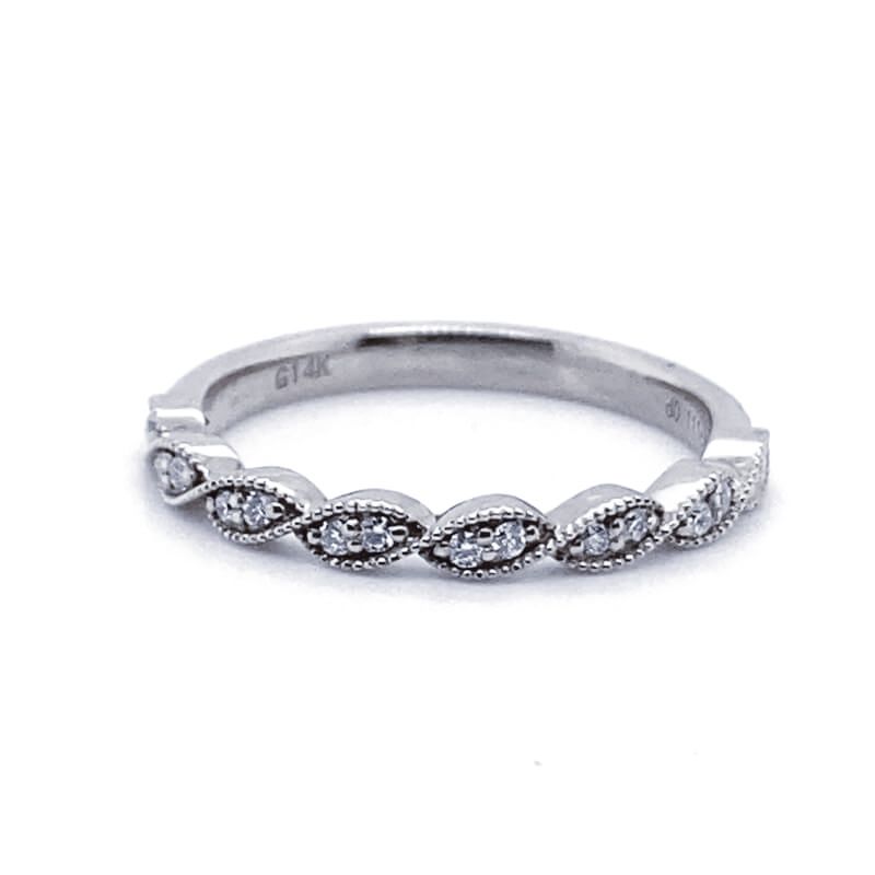 a white gold wedding band with diamonds